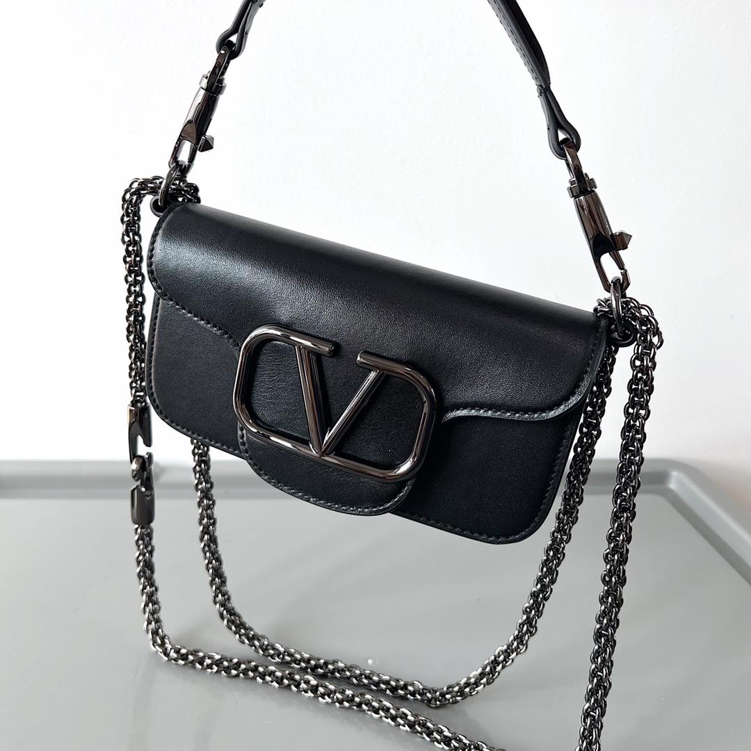 Garavani MINI LOC calfskin handbag with metal VLogo Signature detailsEquipped with detacha