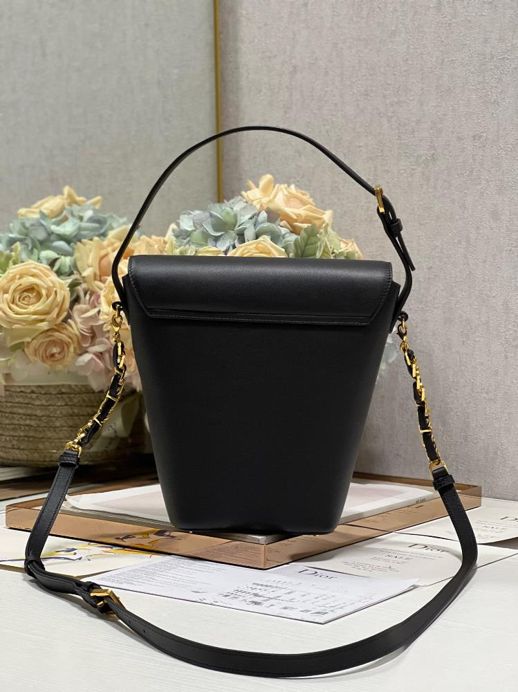 The MONTAIGNE Mini Chain Bucket Bag is more than just a fashion statement it is a reflect