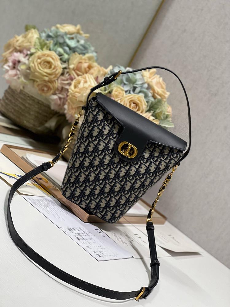 The Dior Bag 2318 MONTAIGNE Mini Chain Bucket Bag is the epitome of elegance and sophi