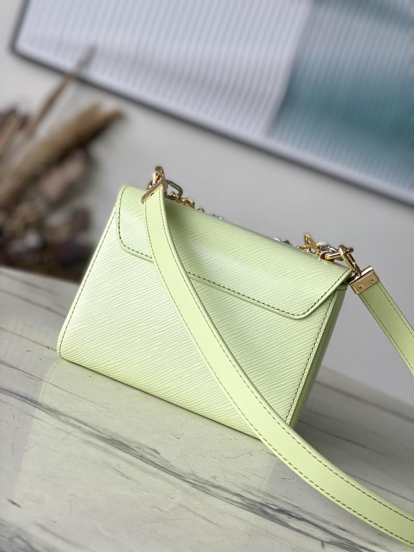 M22768 Apple GreenThis Twist small handbag incorporates the brands iconic Monogram flower