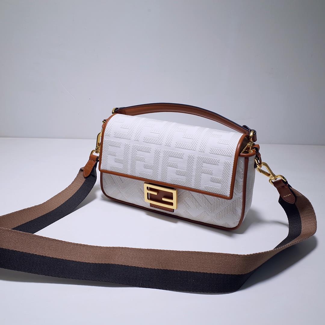 The FEND1 iconic Baguette handbag is made of white canvas material adorned with FF pattern emb