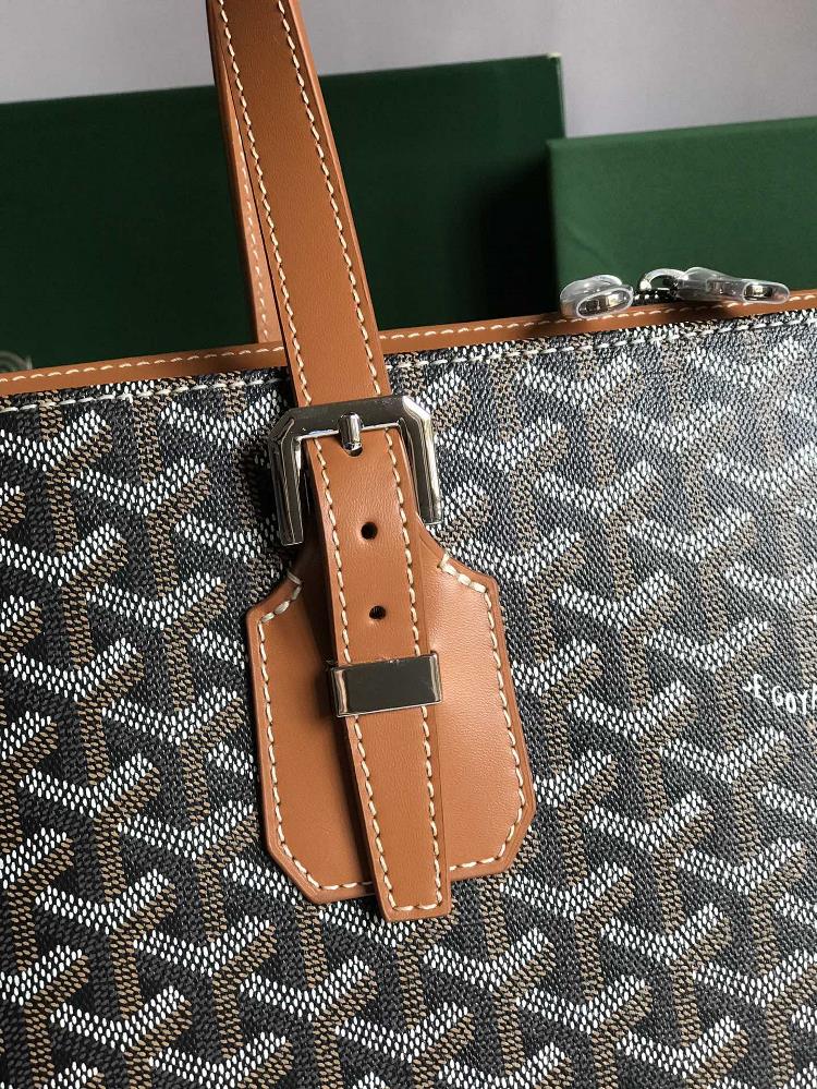 The vintage charm of my Goyard bag is undeniable Its weathered leather and faded monogram