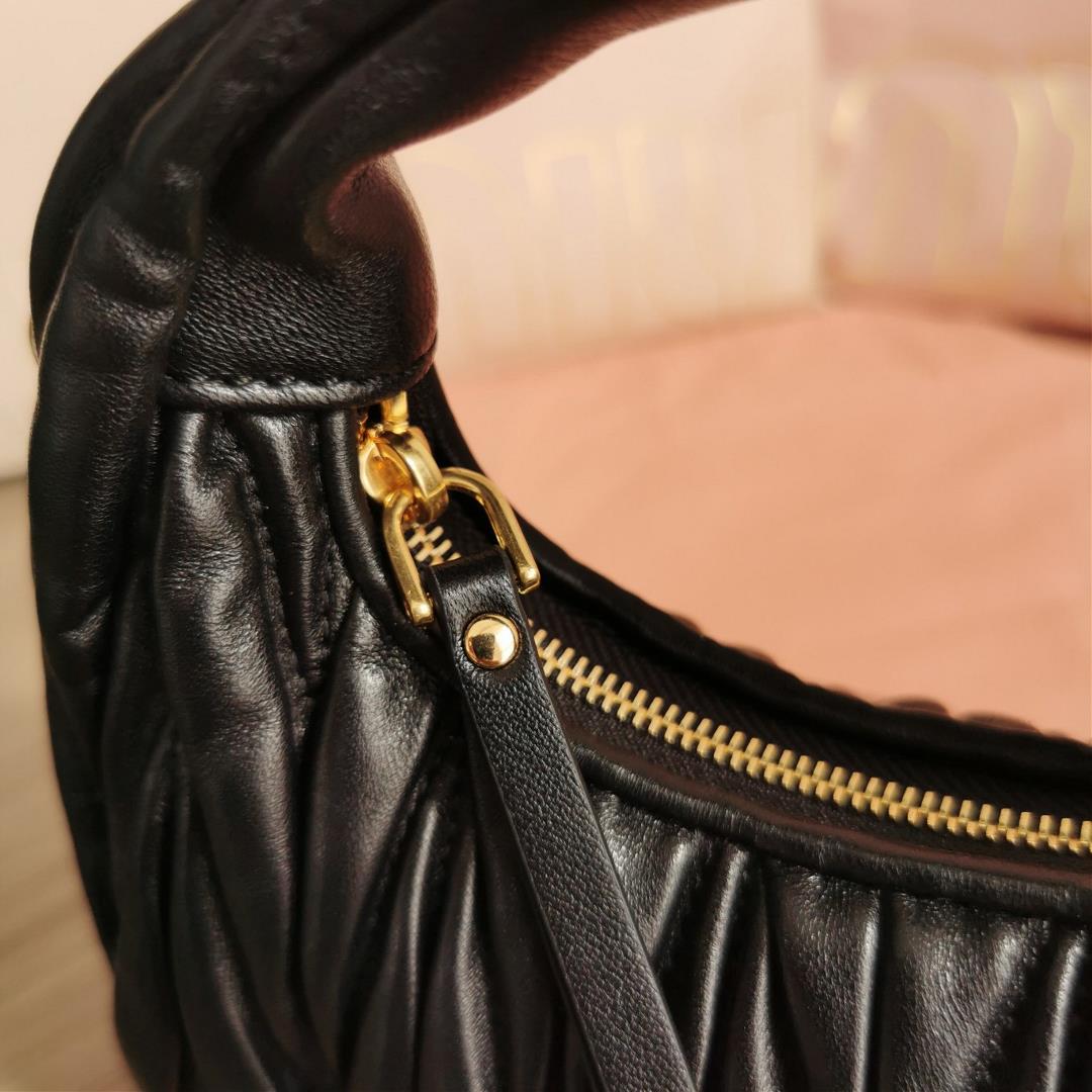 Small size The M familys new mini MiuWander handbag features imported lamb skin classic brand 