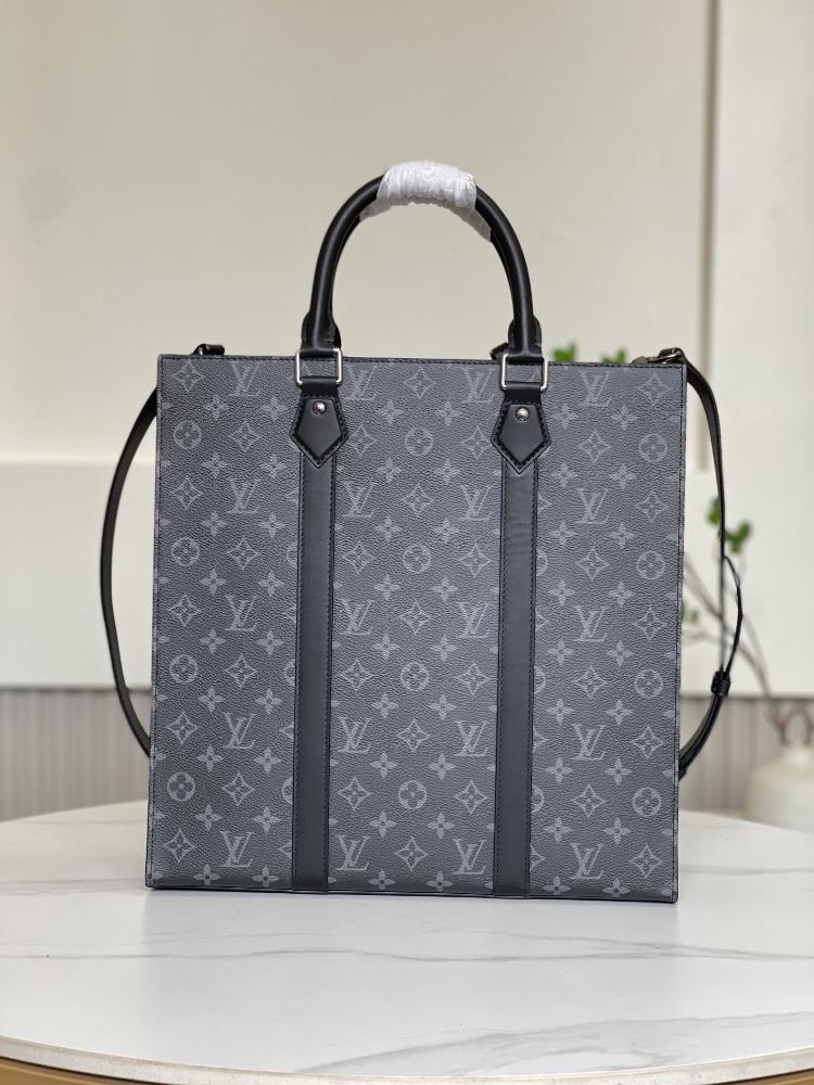 The Monogram Eclipse coated canvas is a modern twist on the classic LV monogram pattern I