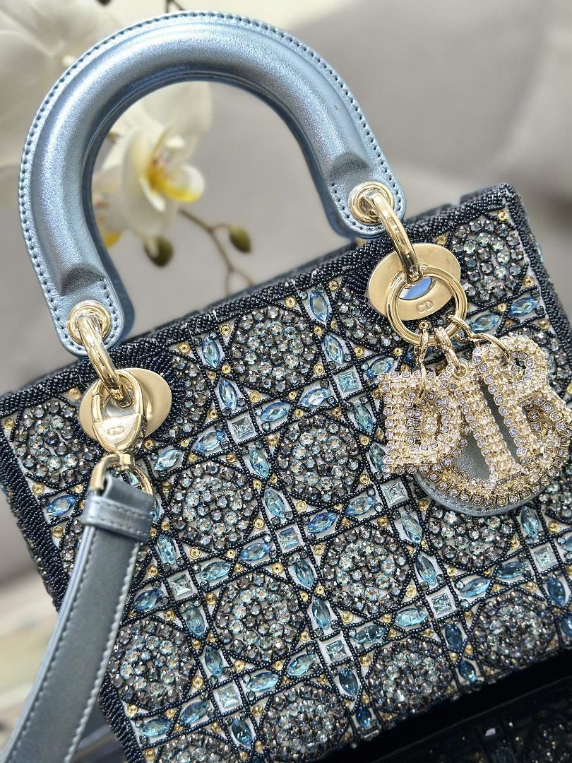 The limited edition of Lady Dior features four embroidered rhinestone blue accents and importe