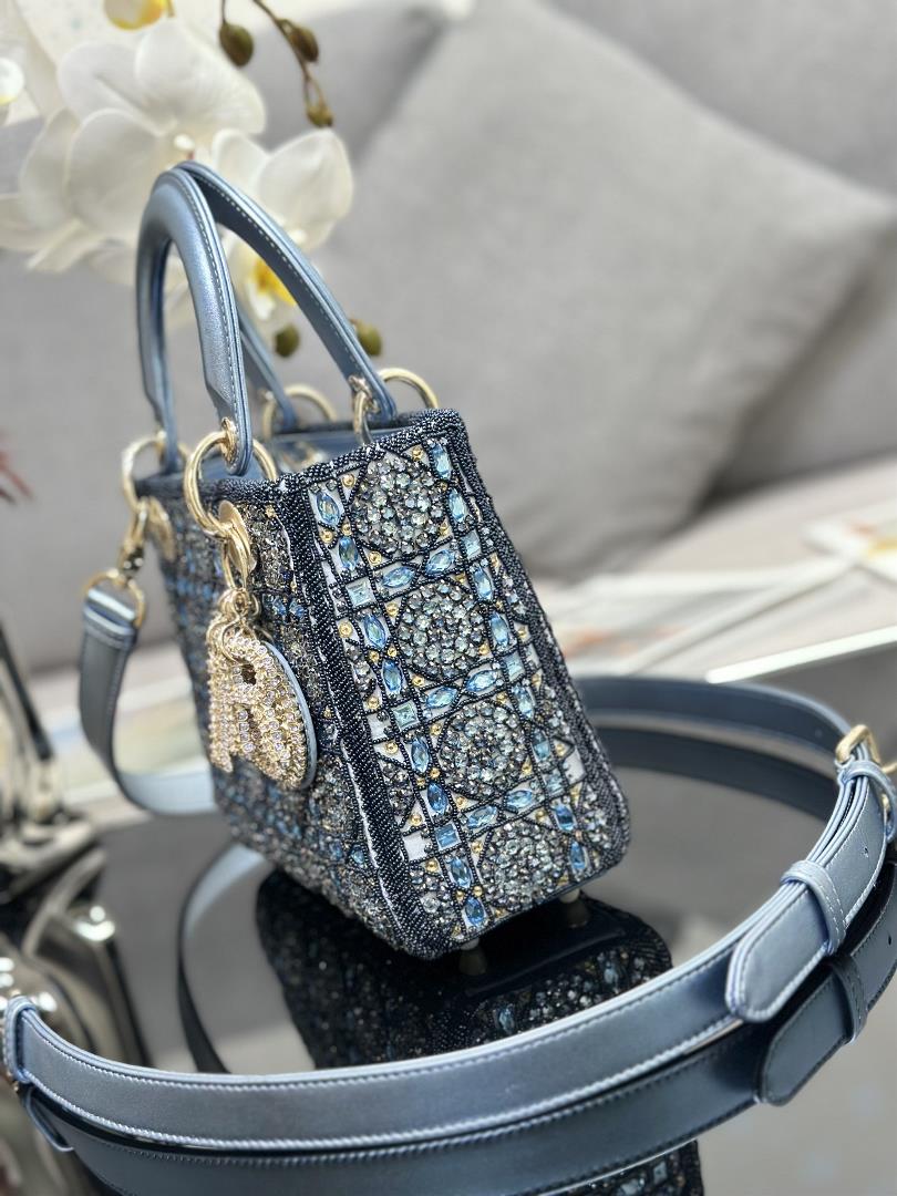 The limited edition of Lady Dior features four embroidered rhinestone blue accents and importe