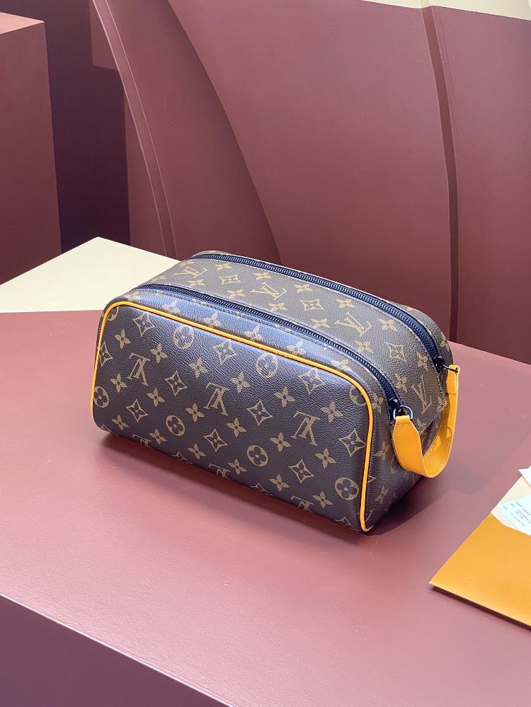 M46696 Old Flower This Dopp Kit grooming bag is made of finegrained Taurillon Monogram le