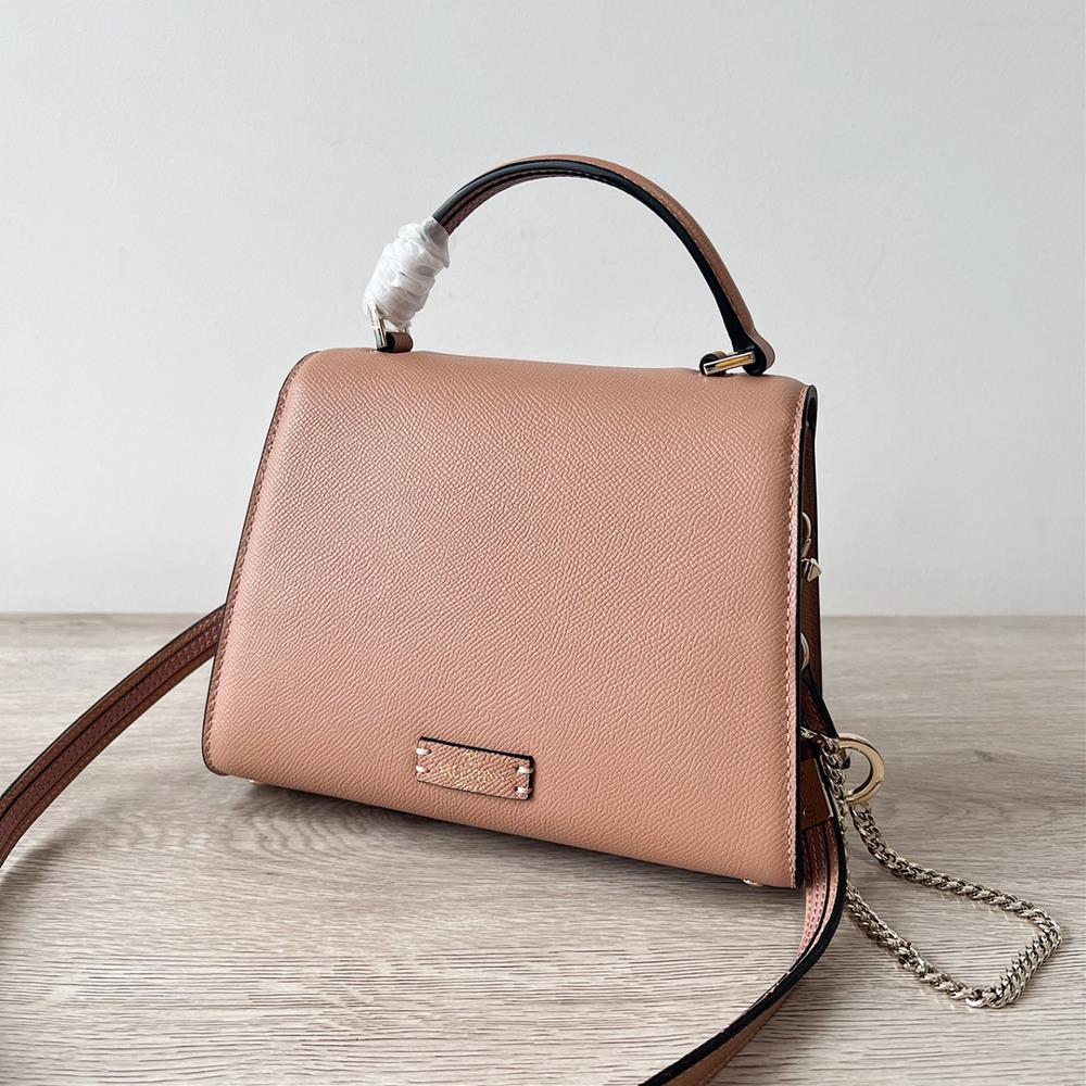 Mini Valentino Garavani VSLINGPaired with an extendable color matching shoulder strap and