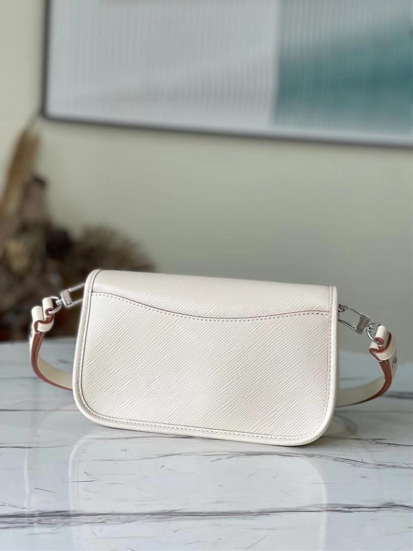 The toplevel original M59457 beige Buci handbag is made of iconic Epi leather with smooth leat