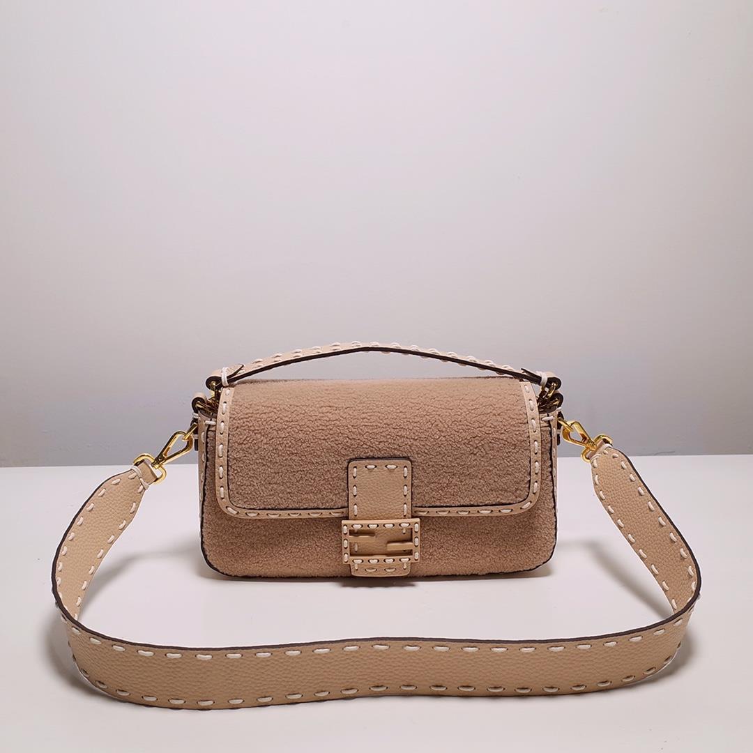 1080 FEND1 signature medium Baguette handbag made of soft pink merino sheepskin with oversized hand 