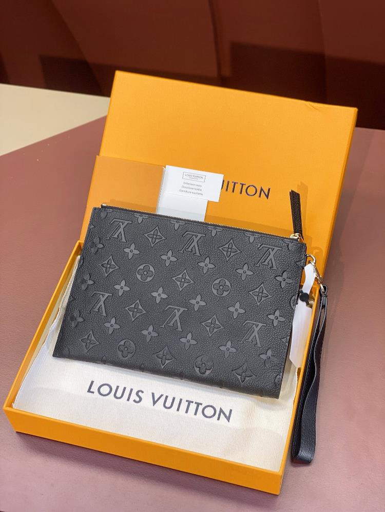 The LV Handbag model M68705 in Monogram canvas is the epitome of timeless elegance and s