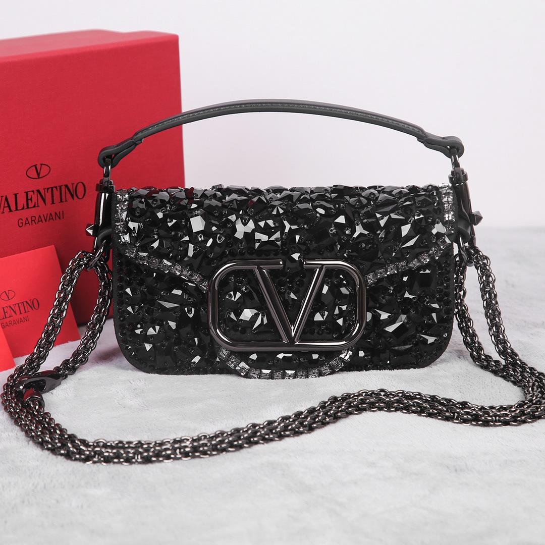 Crystal style The Valentino Garavani Mini Loc handbag is adorned with crystals and Vlogo Signature m