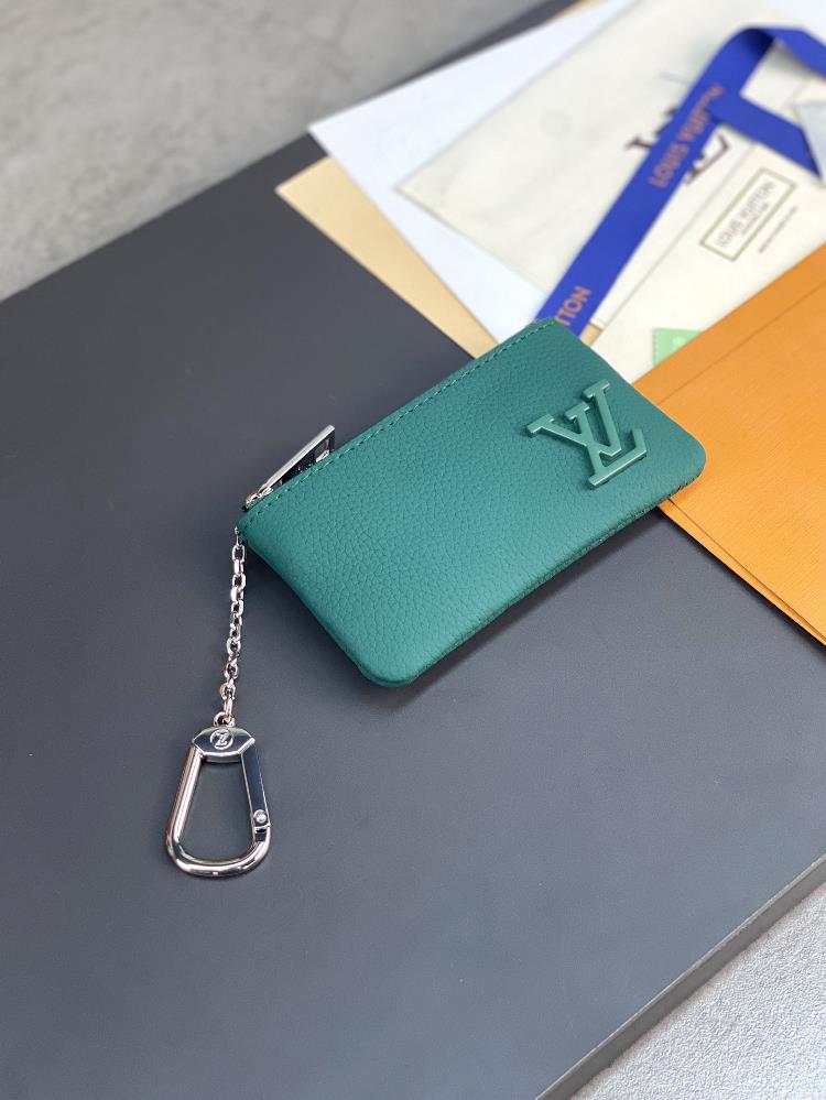 the m81031 green key coin purse is elegant and small with small leather bags which can b