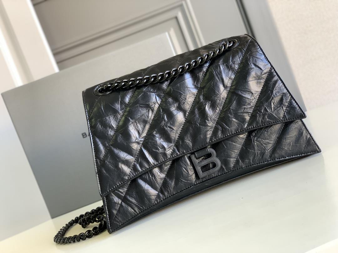 Large black twill medium Crush Quilted Chain Bag MediumThe hourglass bag shape is really amazingThis