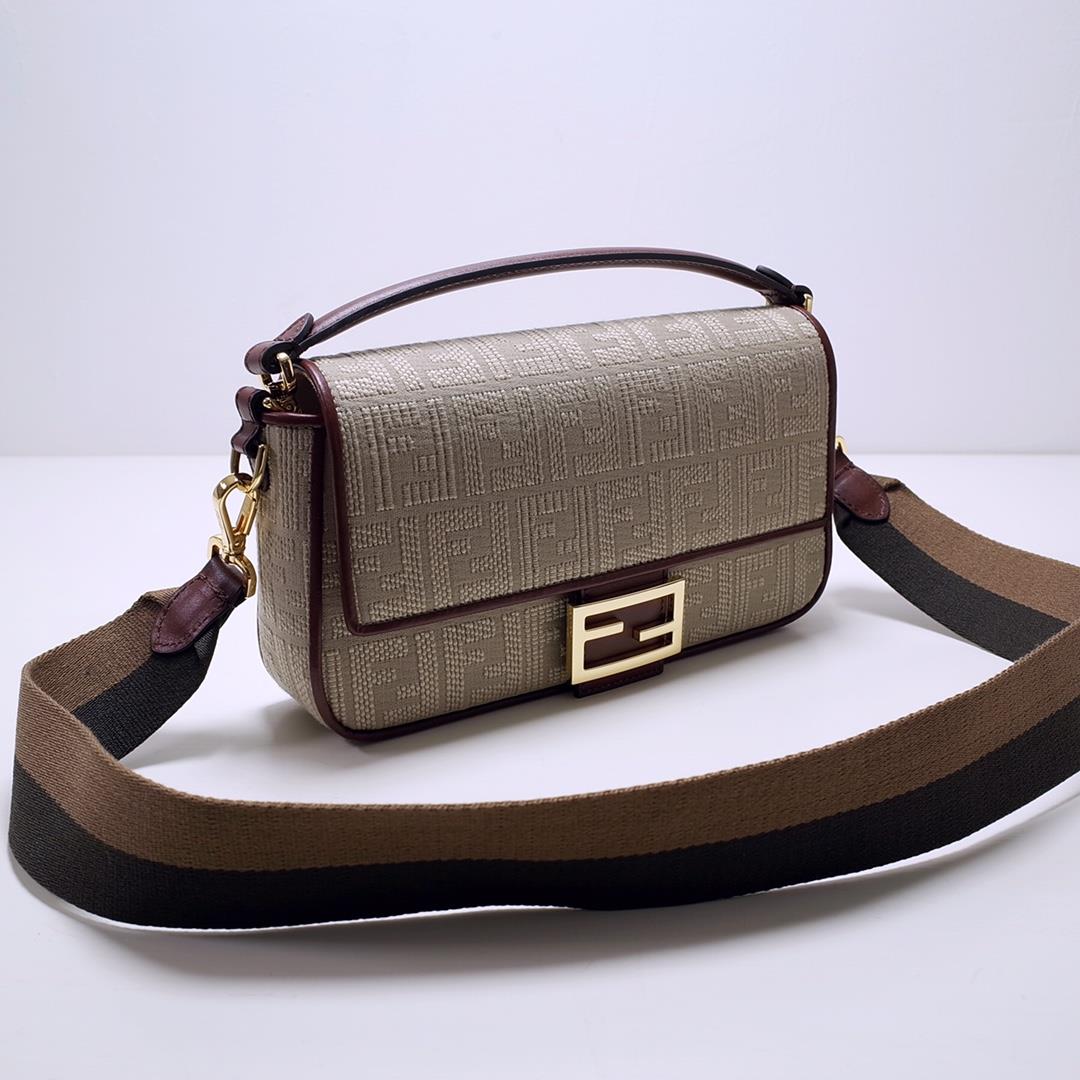 The FEND1 iconic Baguette Medium handbag features a flip design and FF magnetic buckle The lin