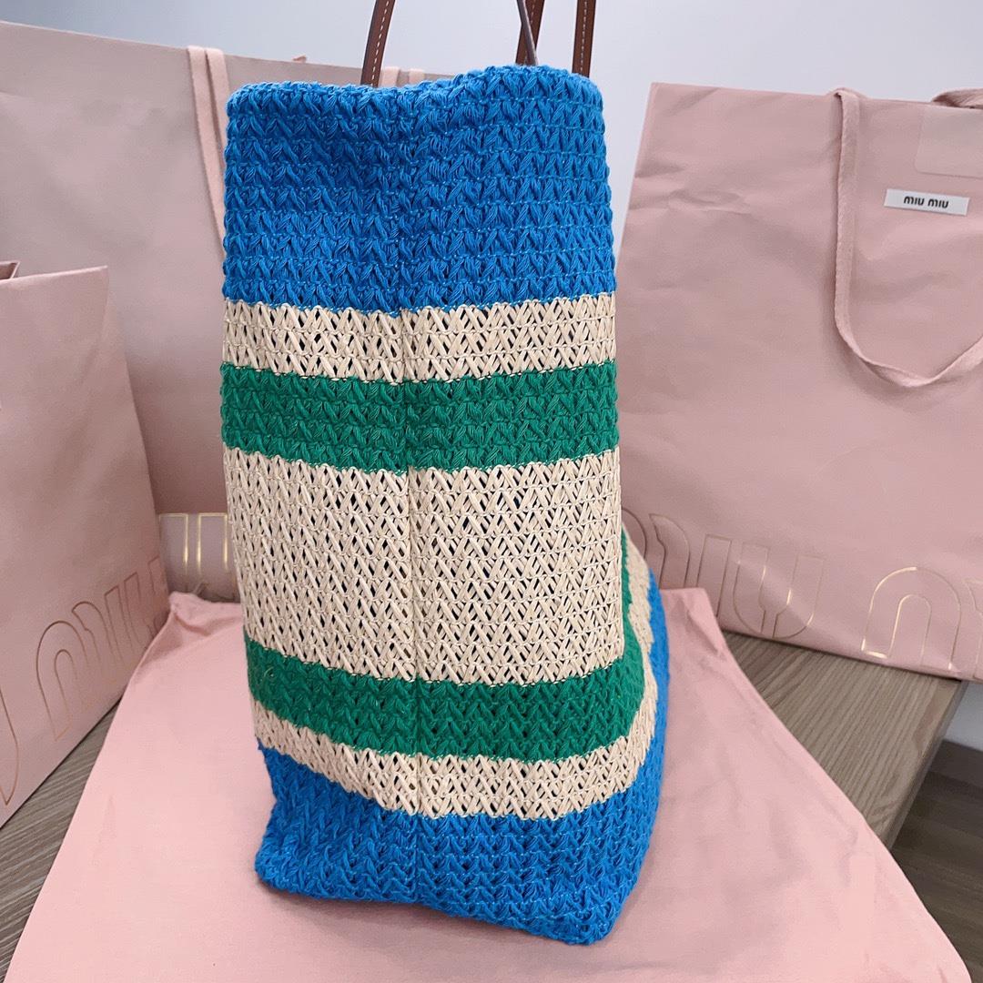 The M familys new imported Lafite grass woven cotton thread woven tote bag has the only matchi