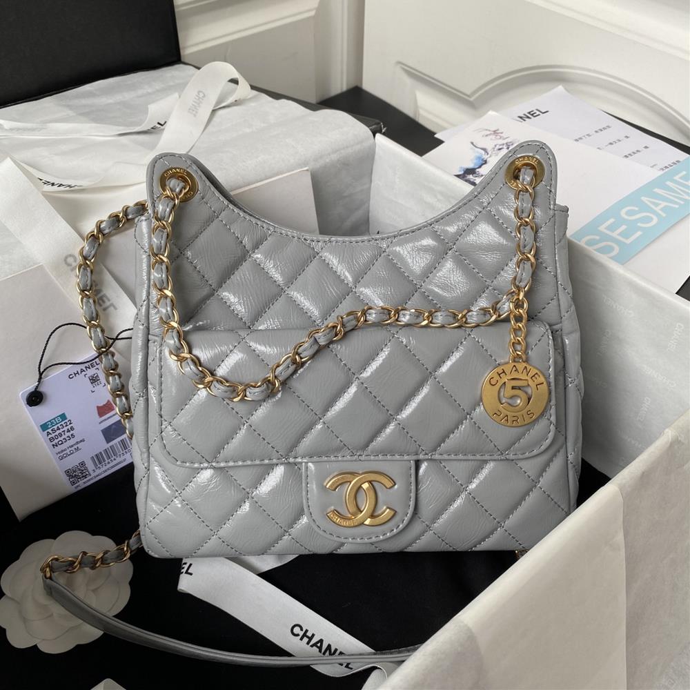 The mid size Chanel 23B AS4322 oil wax leather hobo stable shoulder bag has the highest attention to