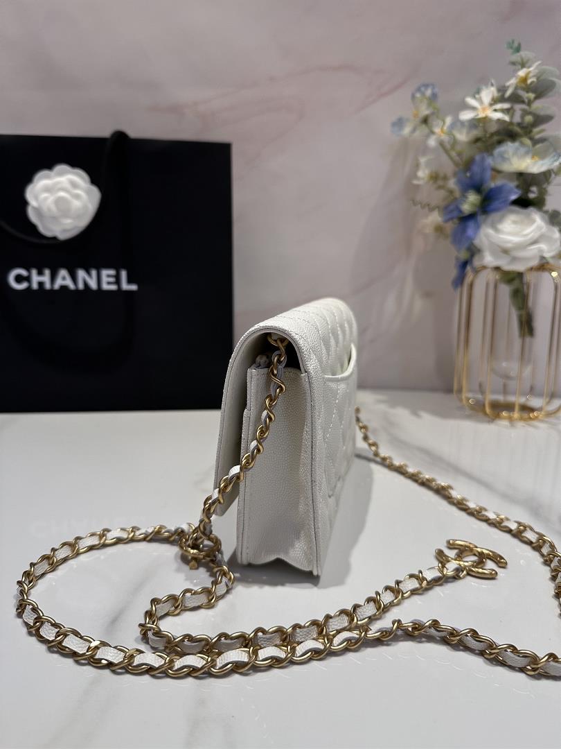 chanel  adjustable chain wocCaviar shines under the light and the hardware logo is very t