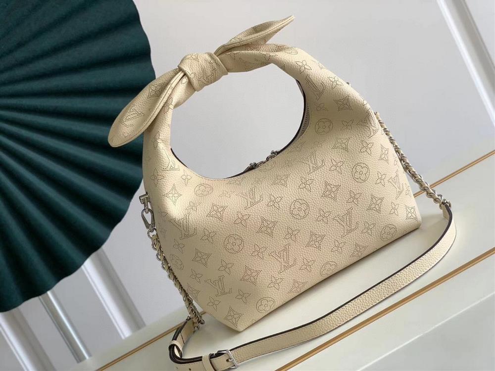 What sets the LV M20700 apart from other handbags is its unique knot detail This subtle y