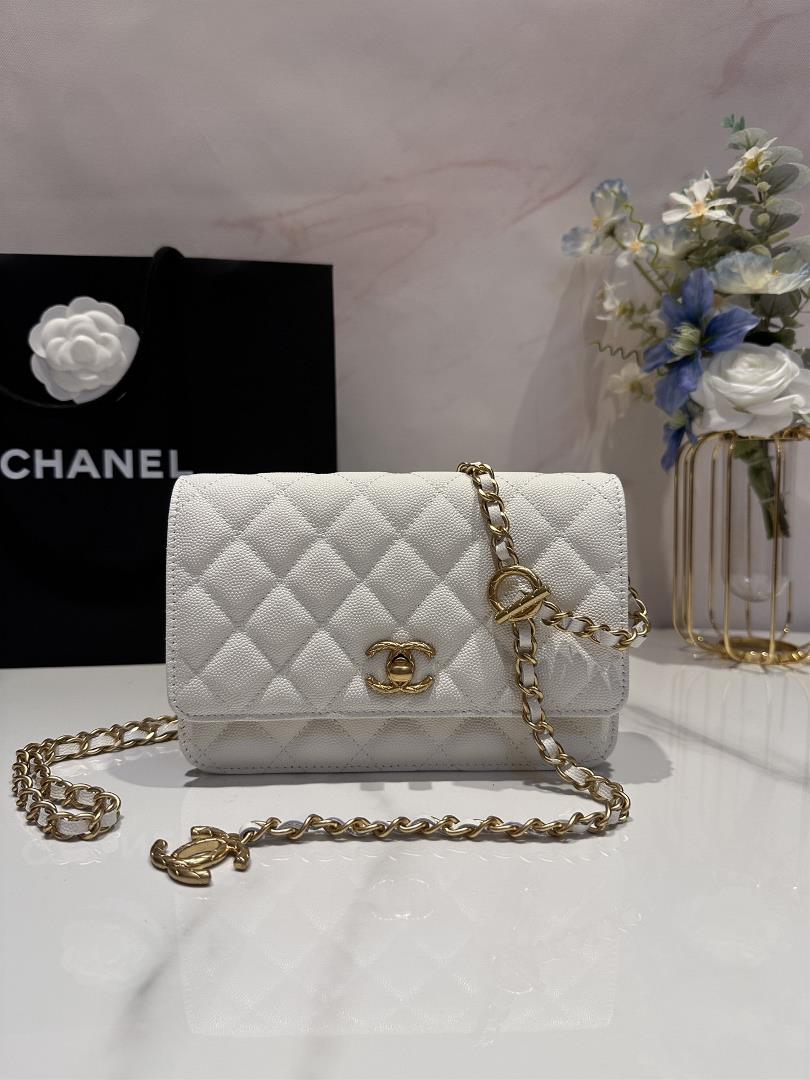 chanel  adjustable chain wocCaviar shines under the light and the hardware logo is very t