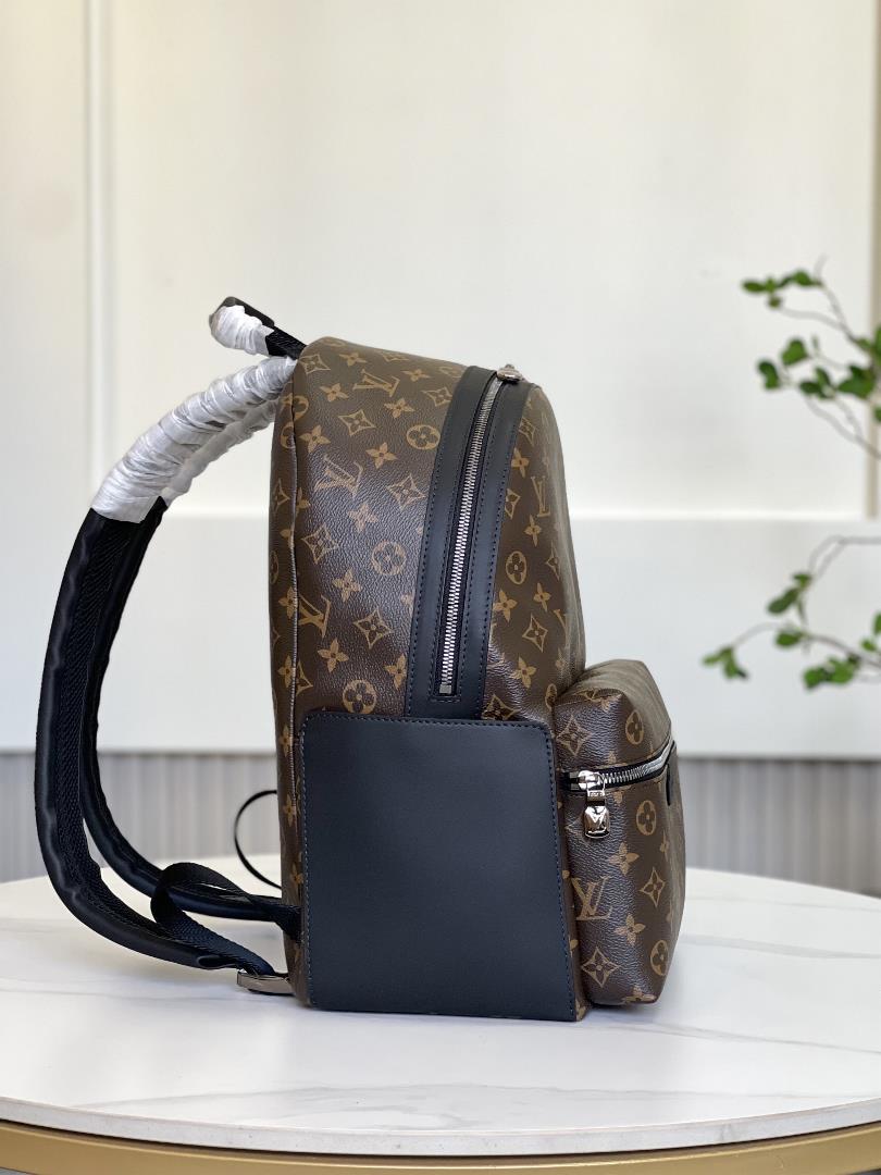 M46684This Discovery Small Backpack is made from Monogram Eclipse canvas and continues its