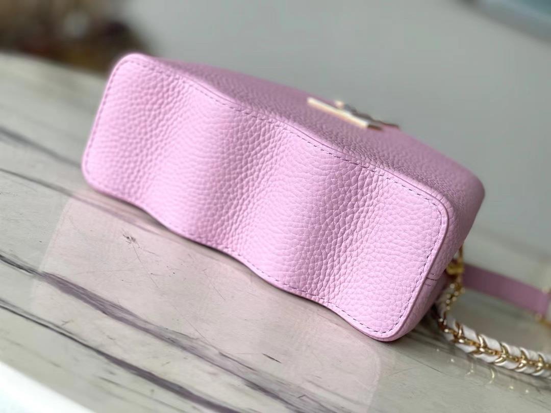 m22122 light purple mini capushell mini handbag is designed with new capucines at the bott