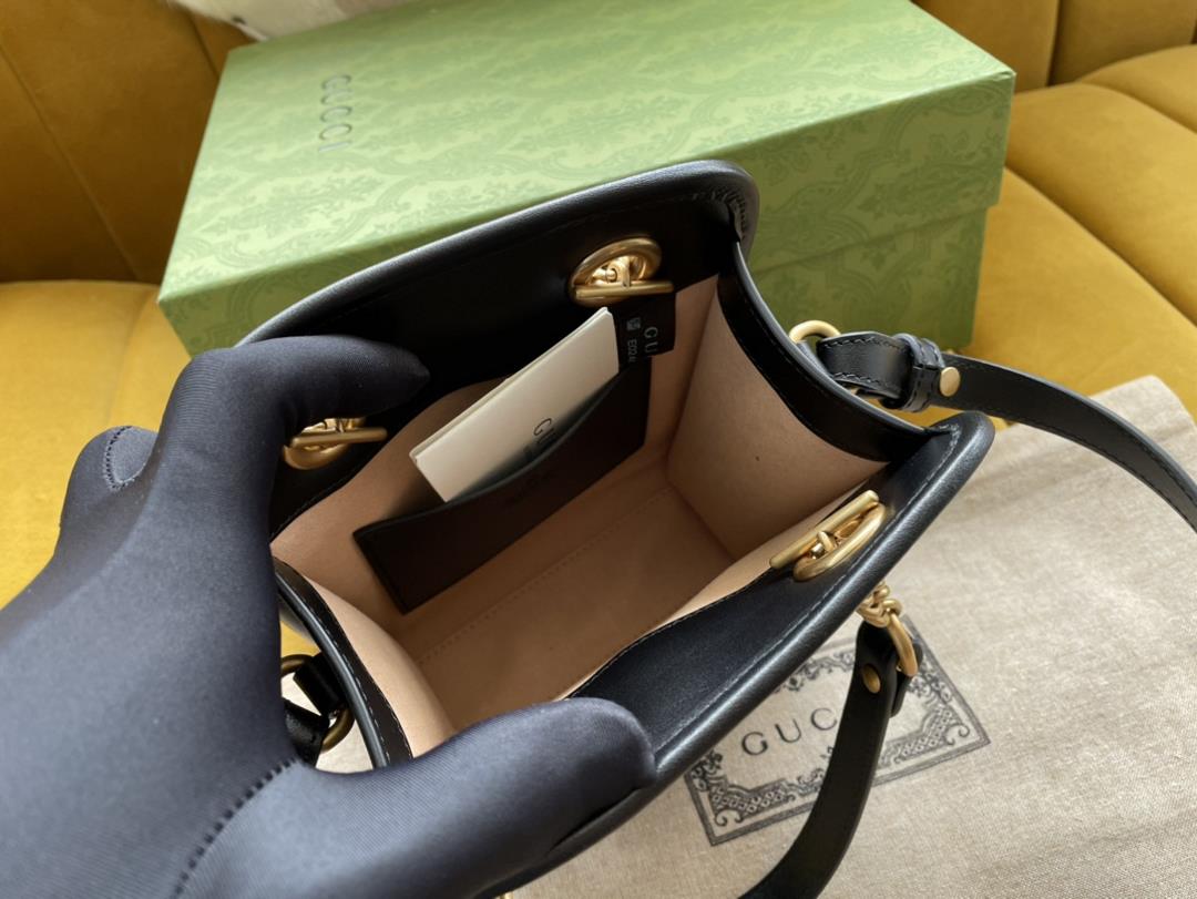 The original 696123 series mini tote bag is made of quilted leather and features a soft yet st