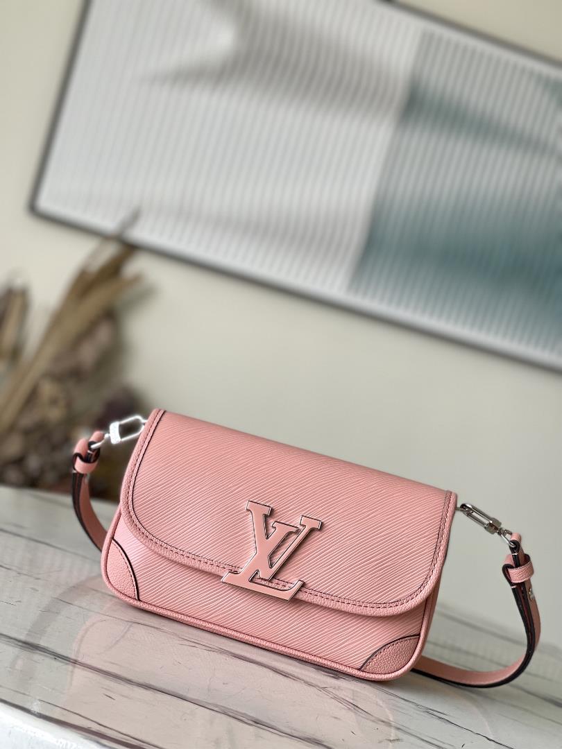 M2098759386 Peach Powder is a Buci crossbody bag made from iconic grain grain Epi leather This seaso