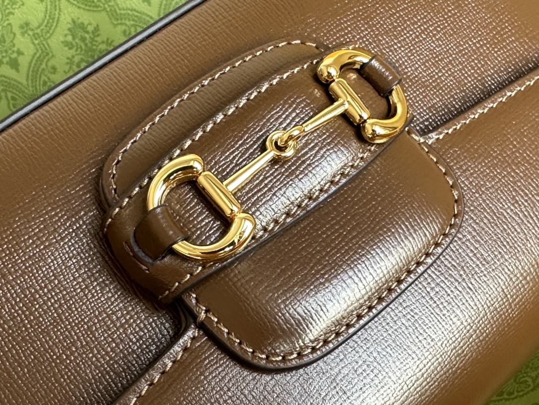  more than 60 years ago, highlighting the unique charm of the horseshoe buckle. This design pa