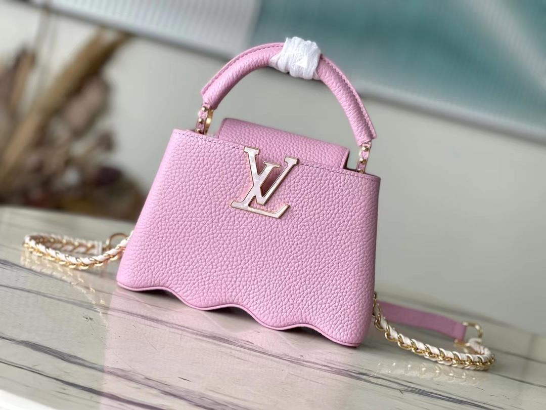 m22122 light purple mini capushell mini handbag is designed with new capucines at the bottom of the