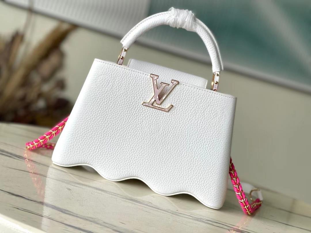 m22121 white waves bottom capushell small handbag is designed with new capucines at the bottom of th