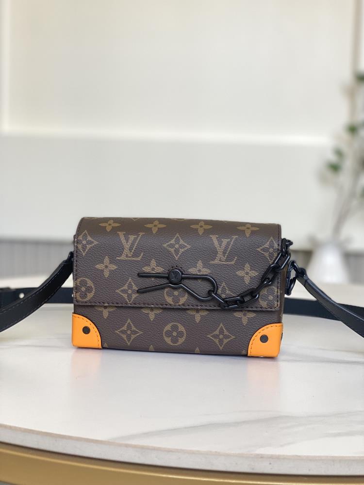 M82534 The Steamer mini handbag is based on classic design concepts combined with Monogram Macassar canvas and leather reinforced corner pockets pai