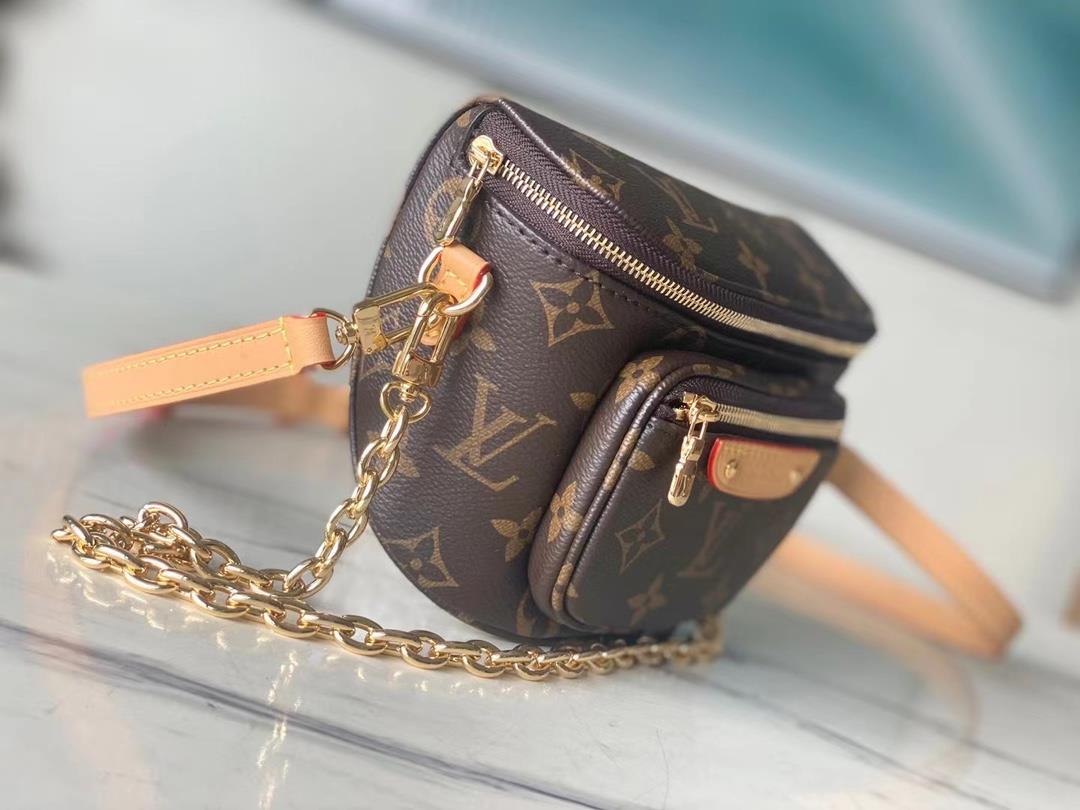 The toplevel original M82335 Mini Bumbag handbag is made of Monogram canvas showcasing a gentl