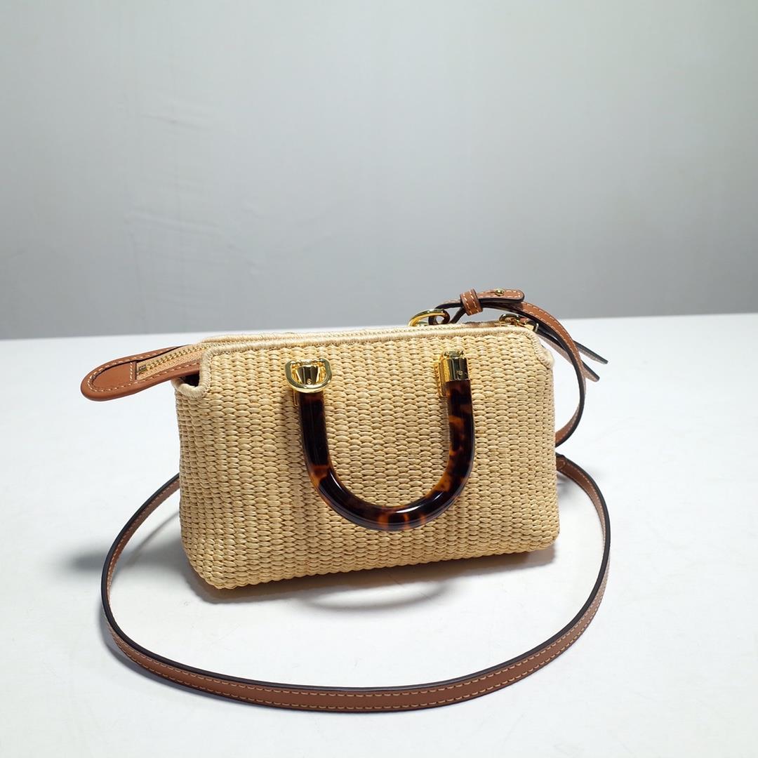 FENDI iconic By The Way Mini Boston handbag made of natural grass woven material showcasing mo