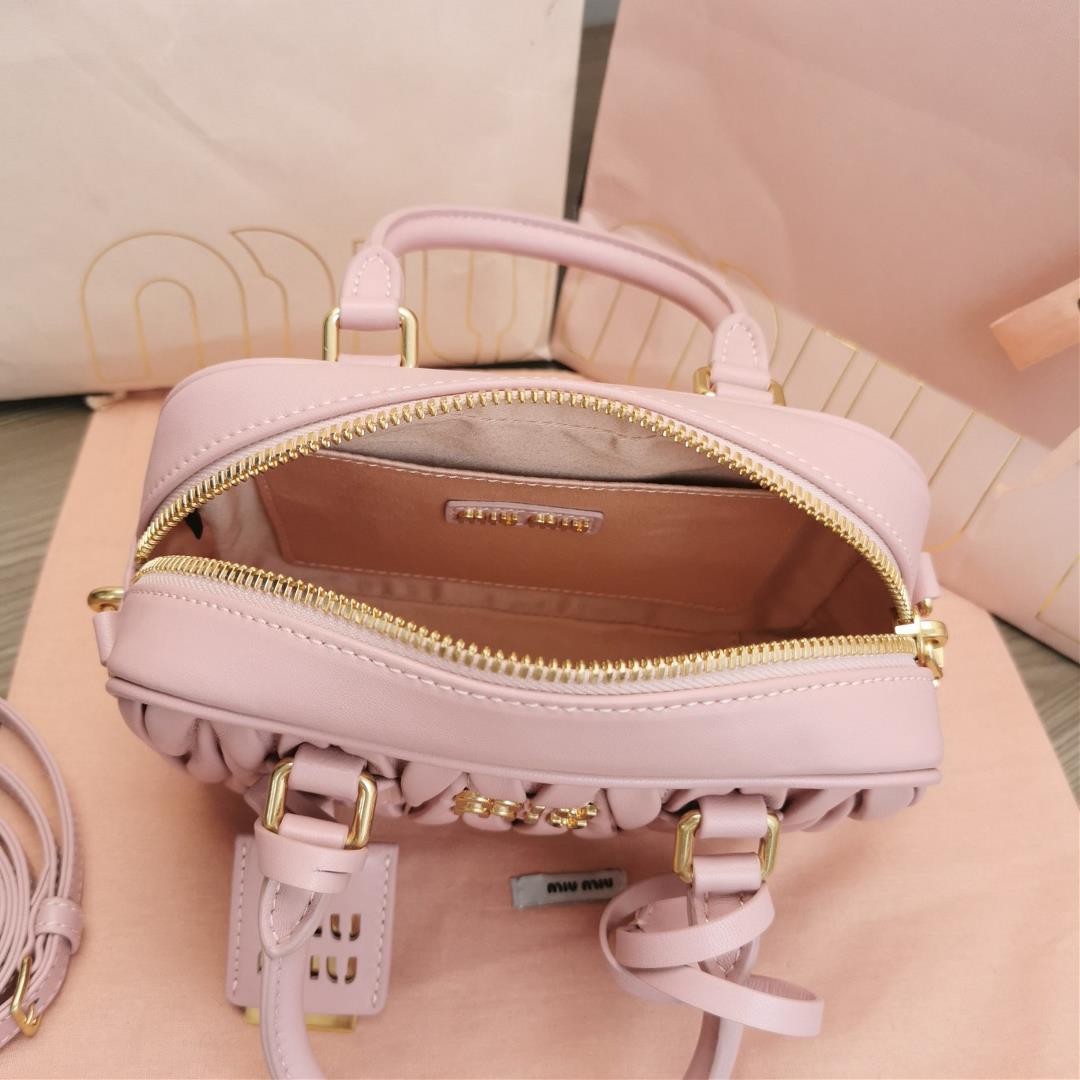 Medium The M familys new product Too Pretty Bowling Handbag features imported lamb skin classi