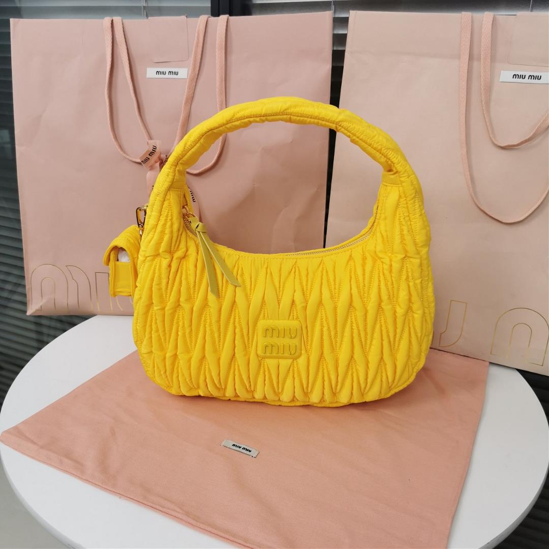 MiuWander handbag a new product of M family is made of environmentfriendly nylon The yarn is made of