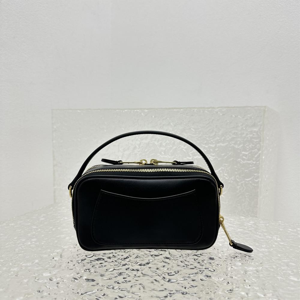 The Miumiu lunch box bag is not your average handbag Its structured silhouette and sleek