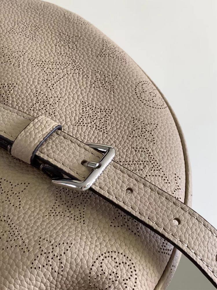 Baia Moon Small Handbag M22820 22959 PunchedMade of soft and pendulous perforated cowhide