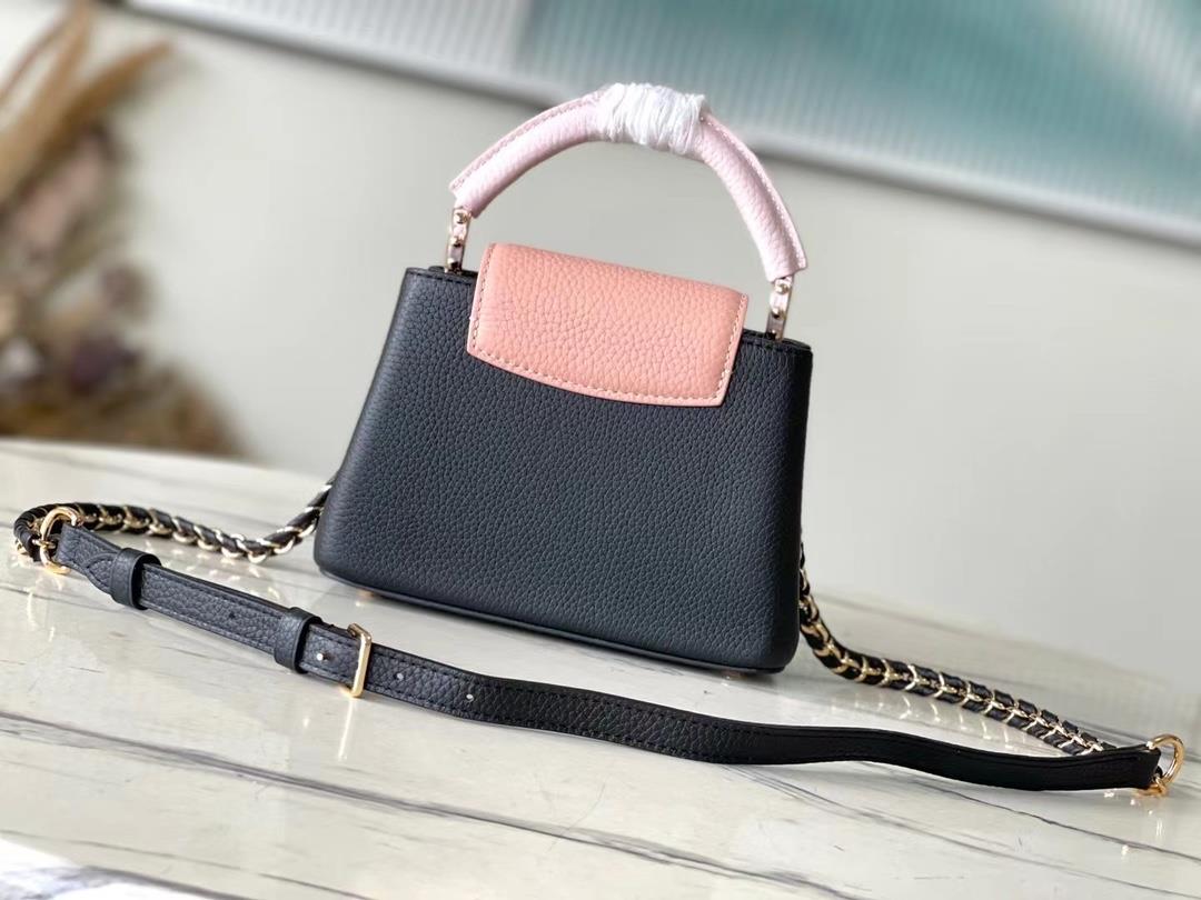 original M21887 black and pink color matching mini Taurilon leather version of the Capuchi