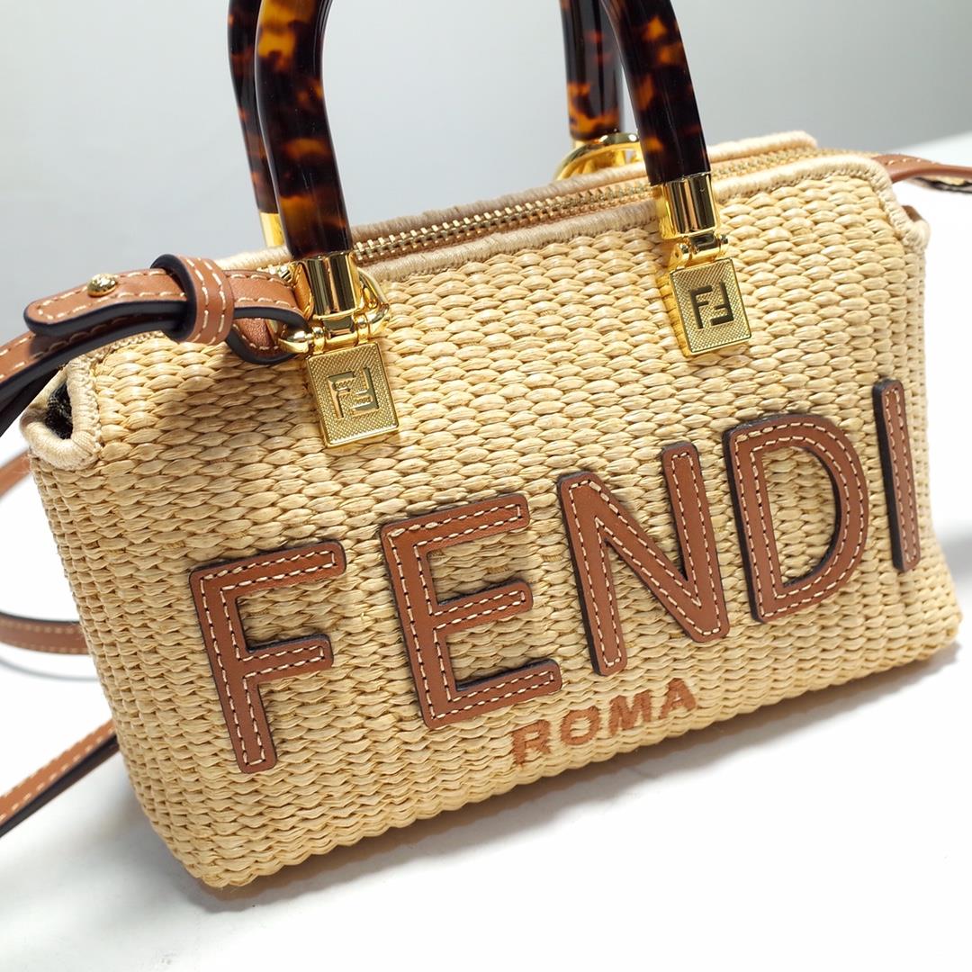 FENDI iconic By The Way Mini Boston handbag made of natural grass woven material showcasing mo