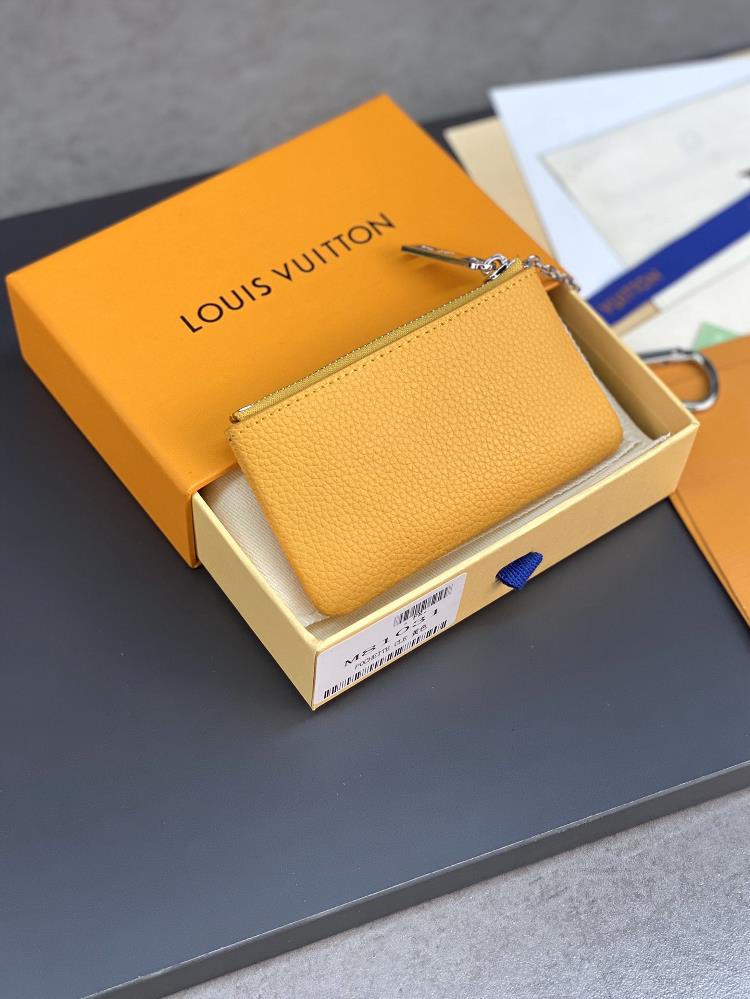 the m81031 yellow key coin purse is elegant and small with small leather bags which can