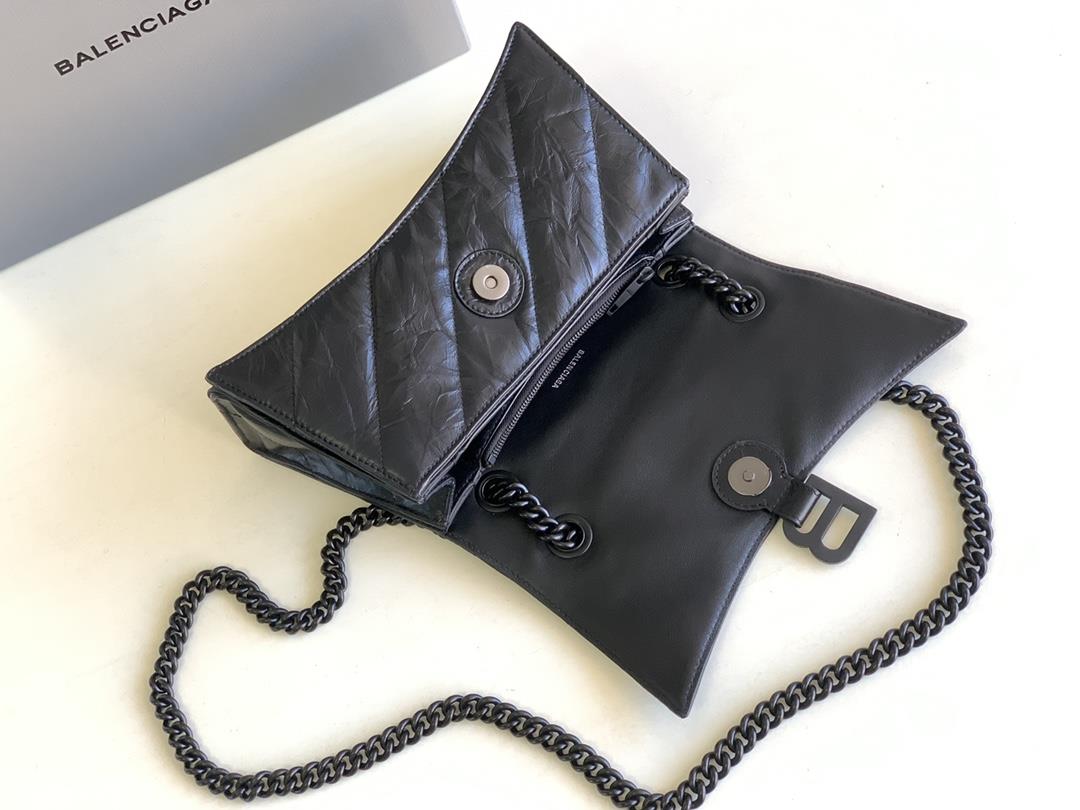 Small black twill small Crush Quilted Chain BagThe hourglass bag shape is really amazingThis t