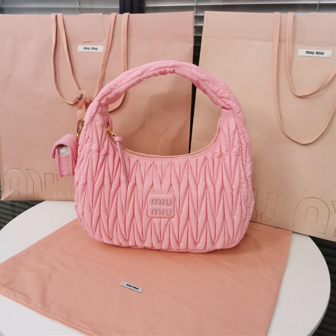 MiuWander handbag a new product of M family is made of environmentfriendly nylon The yarn is made of