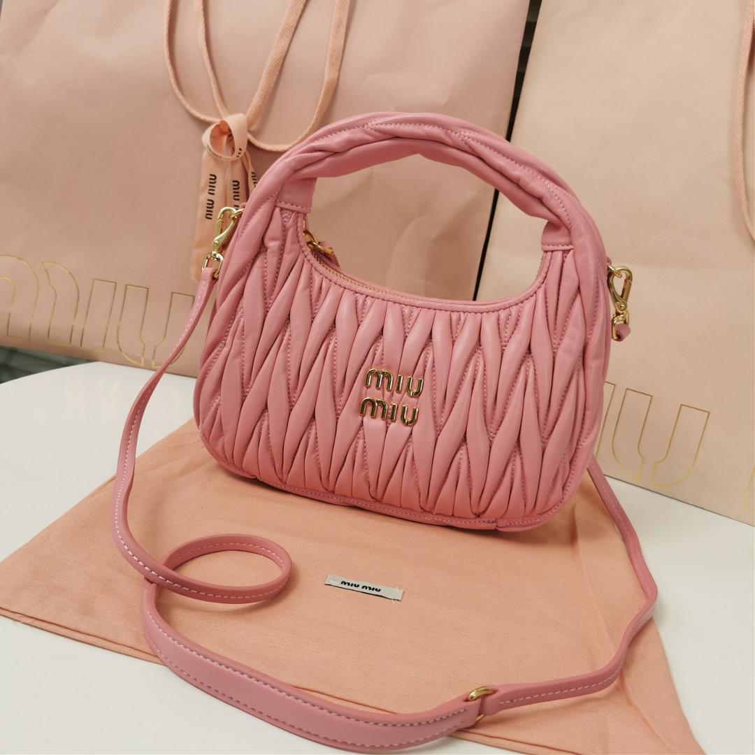 Medium The MiuWander handbag a new product from M family features the iconic Matelasse texture embro