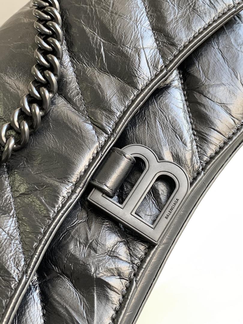 Small black twill small Crush Quilted Chain BagThe hourglass bag shape is really amazingThis t