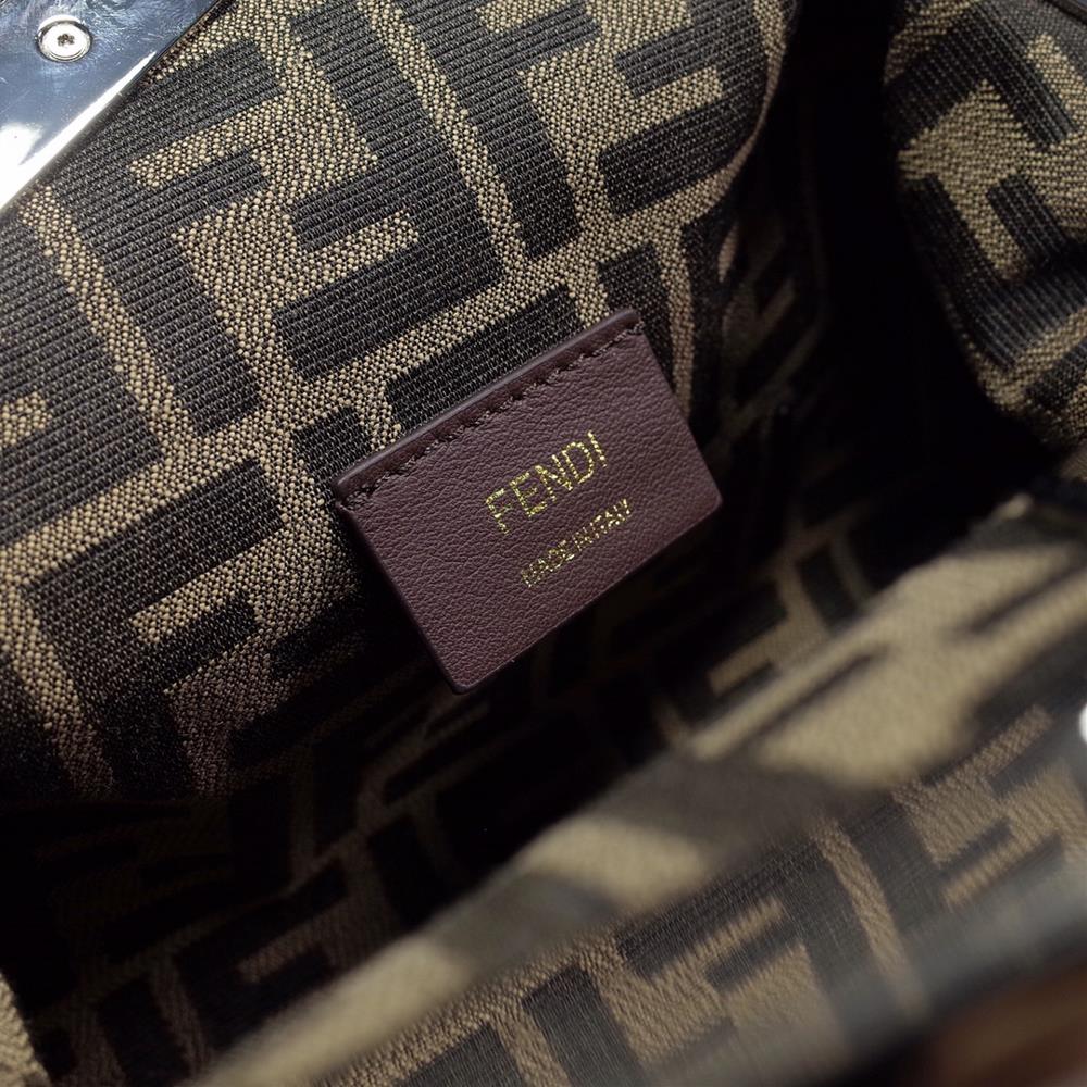 fendi First small handbag features a unique and stylish slanted logo for the new launch w