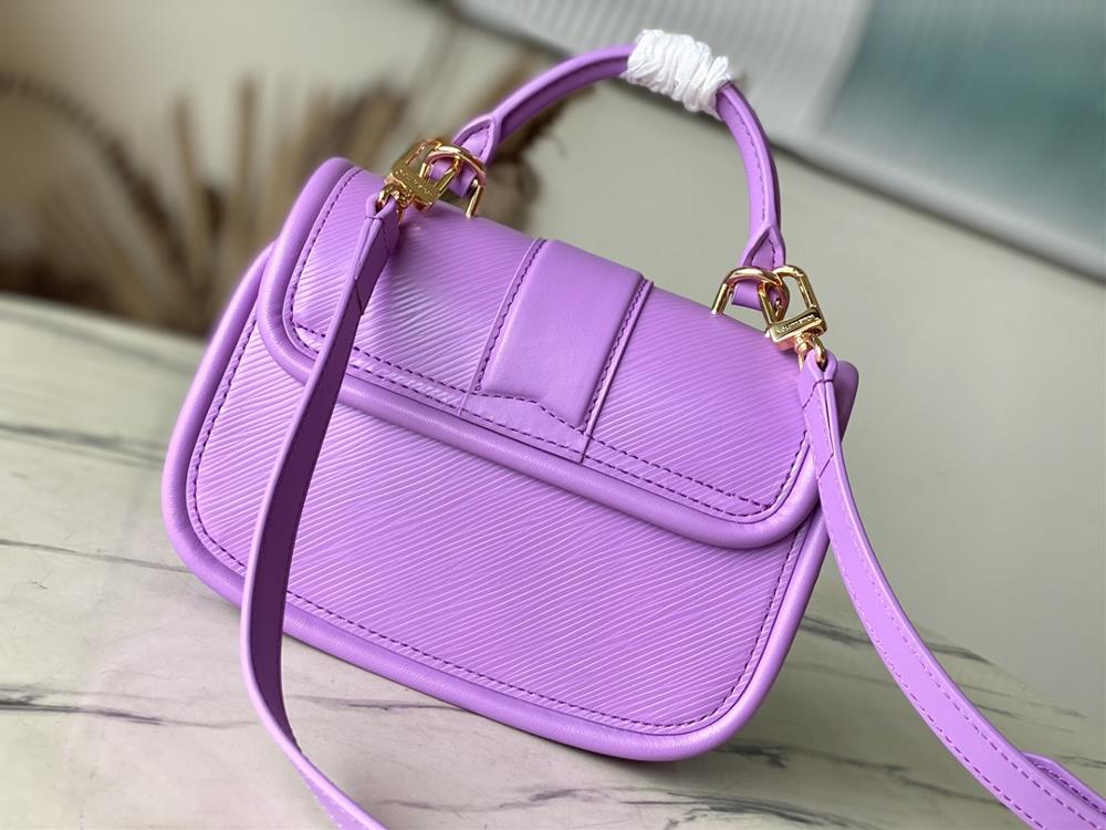 M22721 Taro PurpleThis Hide Seek handbag features Epi leather accents in bright tones fea