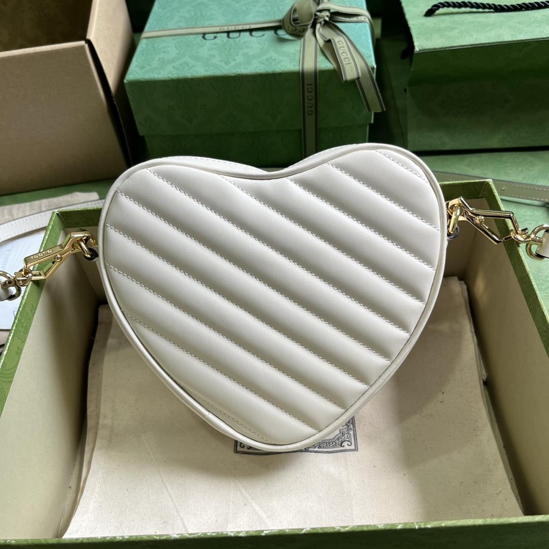 The interlocking G mini heartshaped shoulder bag draws inspiration from the past and pres