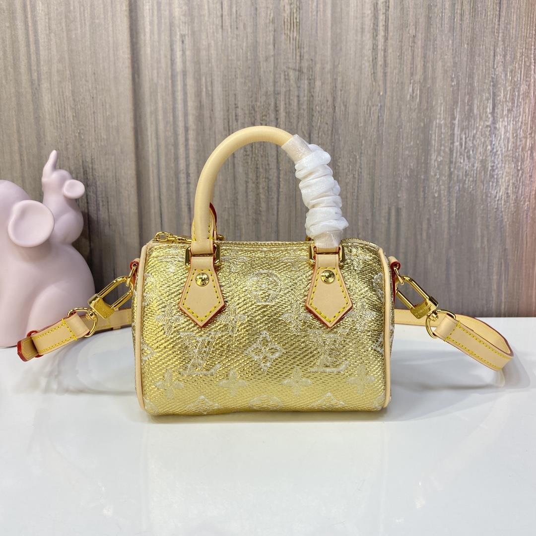 M82242 Gold Nano Speedy Handbag This Nano Speedy handbag incorporates the Monogram series and featur