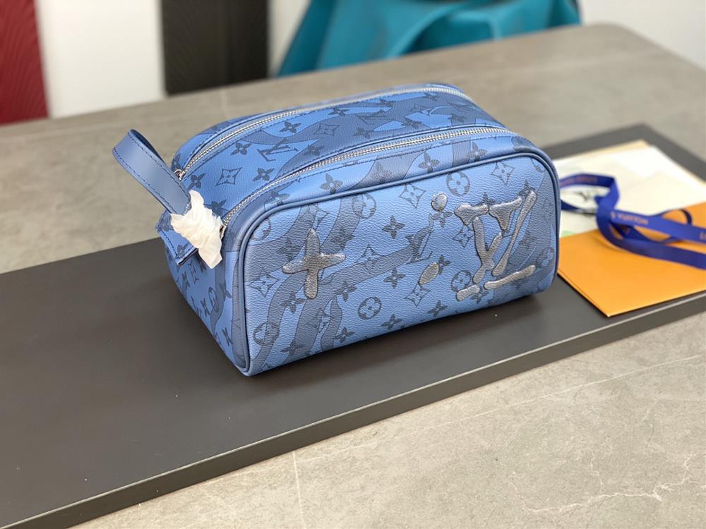 M82337 Drip Glue Blue This Dopp Kit toilet bag is made of Monogram Aquagarden canvas with